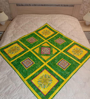 Мастер-класс «Покрывало с вышивкой», выполненный на швейной машине Elna eXcellence 680