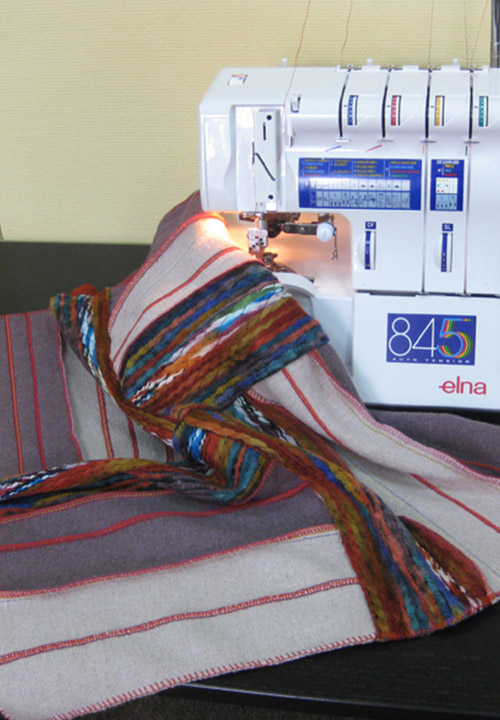 Особенности оверлока с распошивальным швами Elna 845