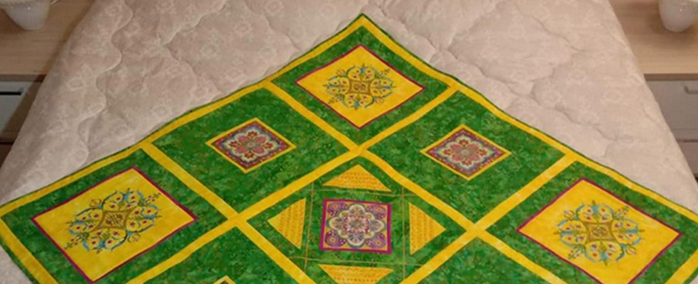 Мастер-класс «Покрывало с вышивкой», выполненный на швейной машине Elna eXcellence 680